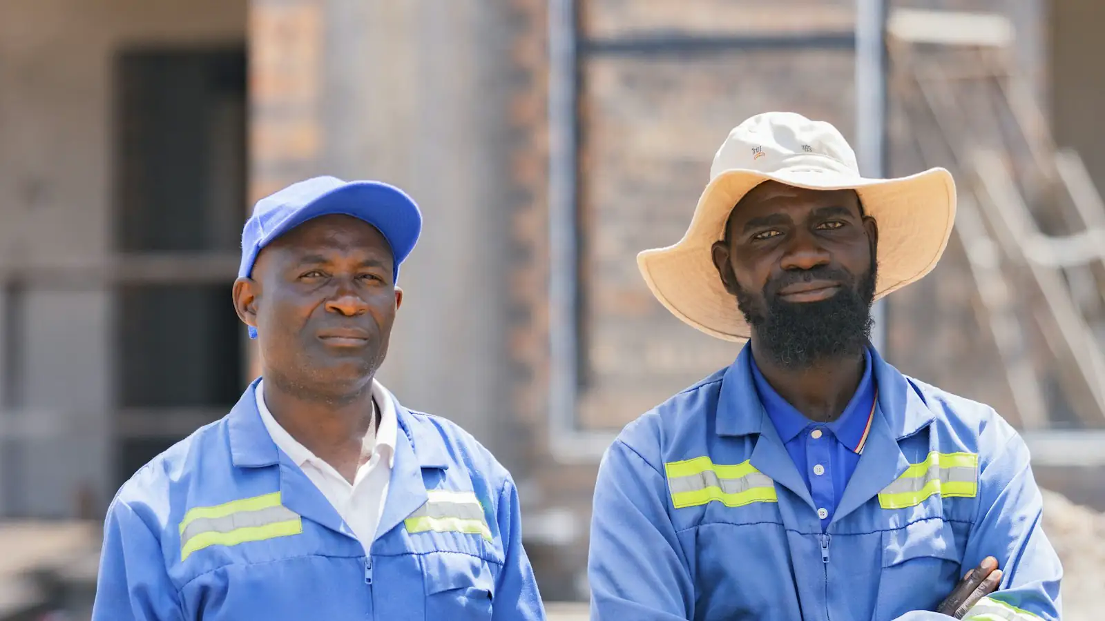 Two HVAC technicians in uniform