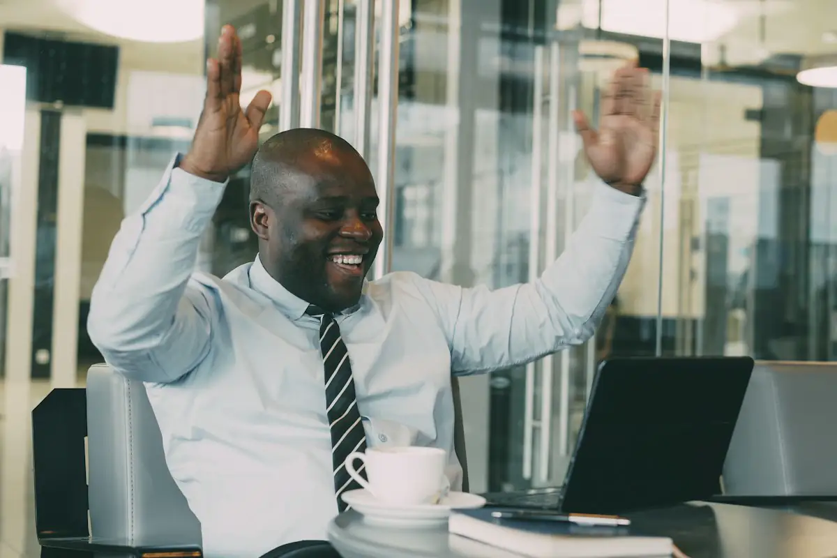 A broker at his desk after closing a loan