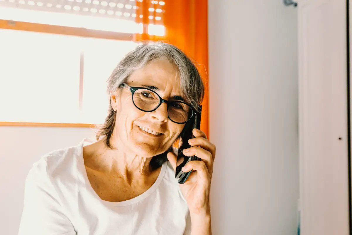 A woman on the phone, mid-call